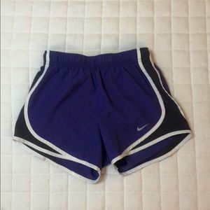 Purple Nike running shorts